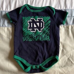 Colosseum Navy and Green Notre Dame Baby Bodysuit